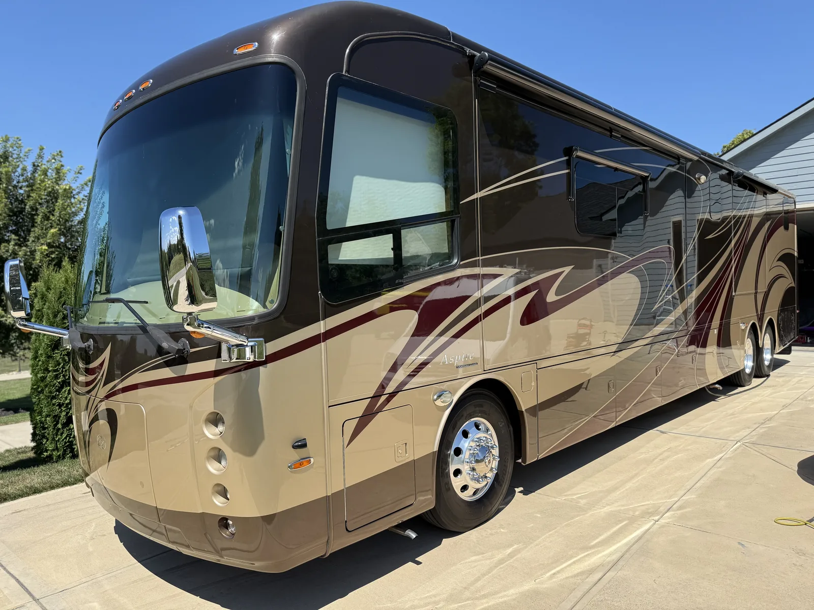 A large Class A motorhome washed and detailed to a deep shine by Wax N' Go